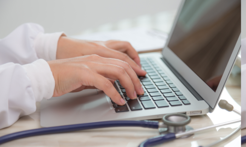 busy-doctor-using-her-laptop